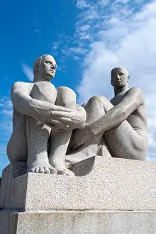 Open Prints: Two young men II granite statue at the Monolith Plateau by Gustav Vigeland