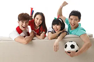 Dressing Prints: Young men and women watching football matches