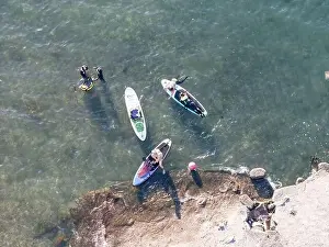 Young people enjoying marine sports such as SUP in Keelung City, Taiwan. September 2024