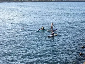 Surfboard Prints: Young people enjoying marine sports such as SUP in Keelung City, Taiwan. September 2024