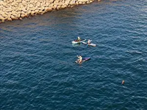Surfboard Prints: Young people enjoying marine sports such as SUP in Keelung City, Taiwan. September 2024