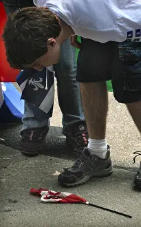 Nationalist Prints: A young Quebec separatist spits on the Canadian flag