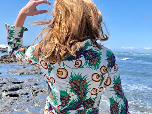 Get Away Prints: young reddish-blonde woman seen from behind