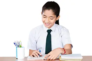 Creative Ideas Prints: One Young School Girl Student Reading Book Study Education In-Class