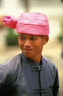 Ethnic Clothing Prints: Young Shan man in traditional costume taking part in a procession at Songkran the Thai New Year Chiang Mai Thailand