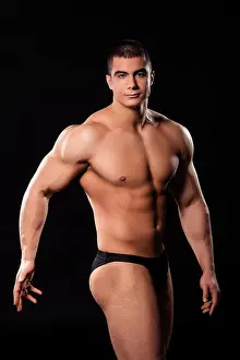 Bodybuilding Prints: Young shirtless bodybuilder posing