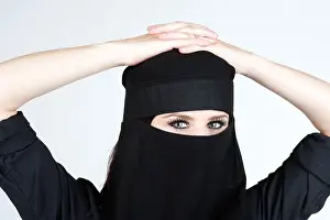 Stare Prints: Young white woman with lovely eyes wearing a Niqab