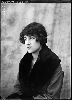Paris Photography Prints: A young woman appears in this 1919 Agence Rol press photograph credited to M