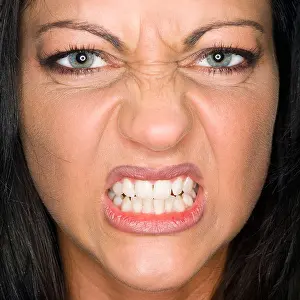 20 30 Prints: Young Woman baring teeth, close-up, portrait
