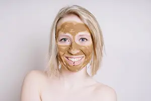 Face To Face Prints: young woman with healing earth or clay beauty facial mask