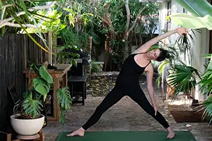 Generation X Prints: Young Woman Practicing Yoga outside