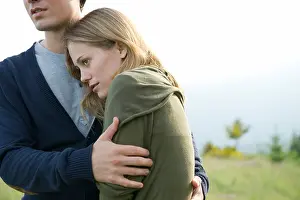 Casual Clothes Prints: Young woman resting head on boyfriend's shoulder