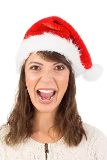 Brunette Prints: Young woman in santa hat yelling