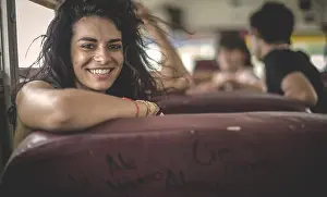 Weekend Activities Prints: Young woman sitting on a school bus