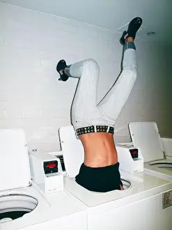 Housewife Prints: Young woman stuck in a washing machine