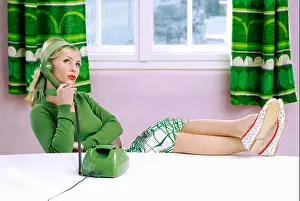 Occupations Prints: Young woman using phone, feet on desk