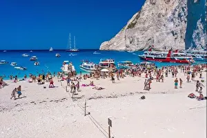 Noon Prints: Zakynthos, Greece - August 20, 2019: Aerial drone shot of tourists on Zakynthos Shipwreck Navagio beach
