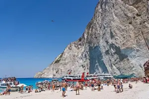 Noon Prints: Zakynthos, Greece - August 20, 2019: drone take aerial photos of tourists on shopwreck Navagio beach in summer