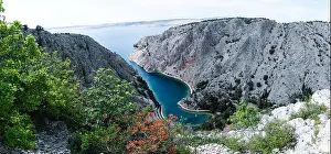 Geosite Prints: Zavratnica is a 900 m long narrow inlet located at the foot of the mighty Velebit Mountains