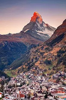 Zermatt, Switzerland. Image of iconic village of Zermatt, Switzerland with the Matterhorn in the background at beautiful sunny autumn sunrise
