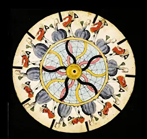 Spinning Prints: Zoetrope optical illusion disc which is spun displaying the illusion of motion of a man bowing