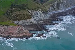 Cantabrian Prints: Zumaia and Algorri geological strata layers drone aerial view panorama, Basque Country