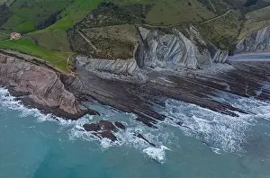 Zumaia and Algorri geological strata layers drone aerial view panorama, Basque Country