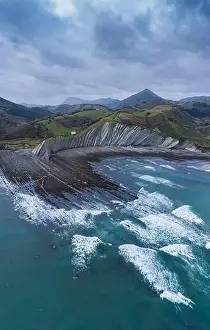 Cantabrian Prints: Zumaia and Deba flysch geological strata layers drone aerial view, Basque Country