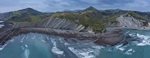 Cantabrian Prints: Zumaia and Deba flysch geological strata layers drone aerial view, Basque Country