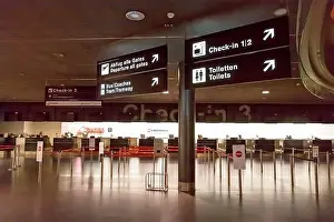 Zurich, Switzerland - June 11, 2017: Zurich airport, Check-in desk 3, sign to departure gates, tram, toilets
